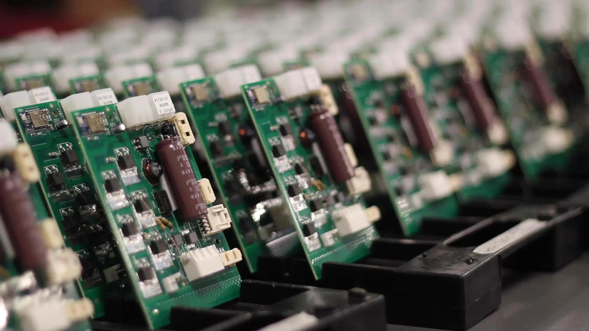 image of rows of electronic assembly boards at levison enterprises