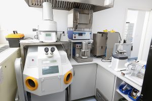 Computer controlled dental microscope and medical equipment in a hi-tech modern laboratory.