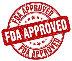 FDA Approved rubber stamp in red lettering. 