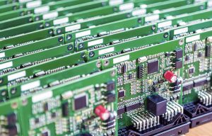 Printed circuit boards placed in rows together. 