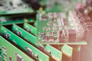 A stack of printed circuit boards.