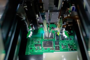 Closeup of a printed circuit board being tested and manufactured. 